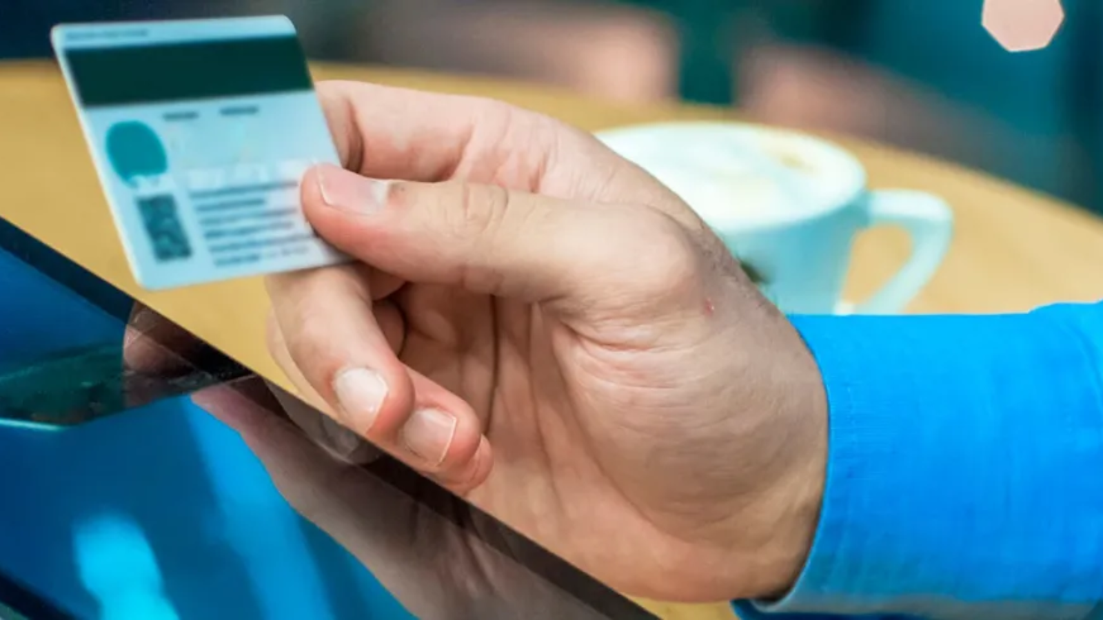 Travel agent using tablet with credit card to lock airfare session and secure best deals