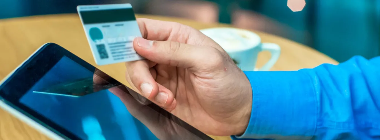 Travel agent using tablet with credit card to lock airfare session and secure best deals