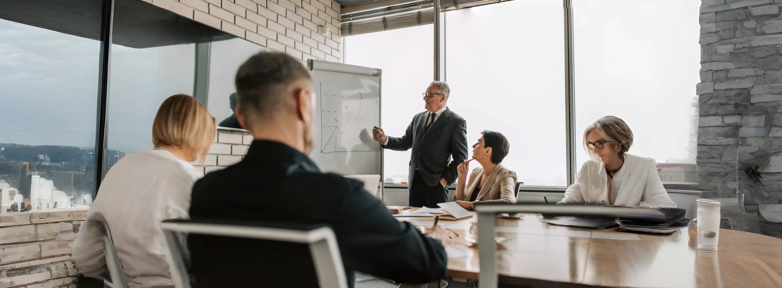 Travel agency leaders reviewing operational strategies and revenue plans to navigate global uncertainty and shifting travel markets.